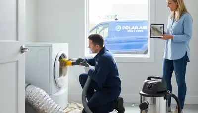 Technician cleaning dryer vent for home safety in Knoxville, TN – Five Star Cooling service